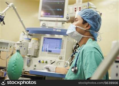 Anesthetist Working In Operating Theatre