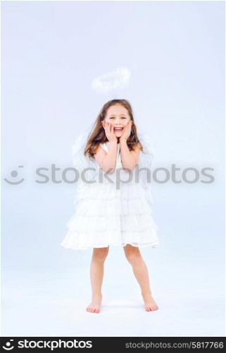 Angel child girl with pure white wings