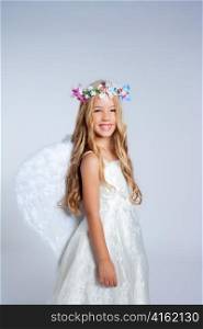 Angel children little girl portrait with fashion white wings and flowers crown