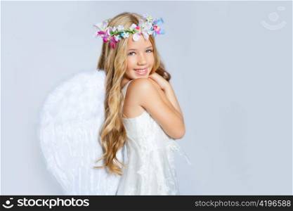 Angel girl children sweet expression and fashion white wings with flowers crown