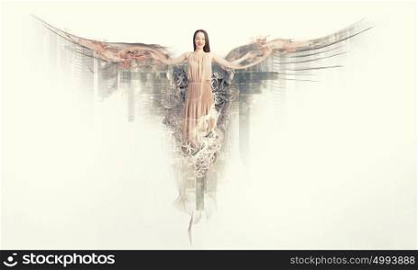 Angel girl in dress. Attractive woman with angel wings on white background