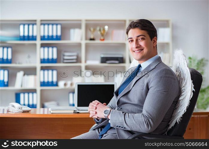 Angel investor concept with businessman and wings