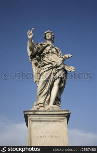 Angel sculpture from Ponte Sant&acute;Angelo bridge in Rome, Italy.