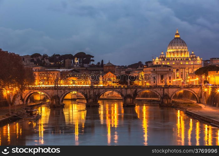 Angelo Bridge and St. Peter&rsquo;s Basilica at dusk, Rome, Italy