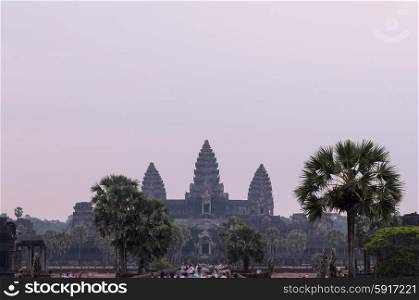 Angkor Wat, part of Khmer temple complex, popular among tourists ancient landmark and place of worship in Southeast Asia. Siem Reap, Cambodia.