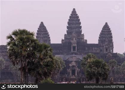 Angkor Wat, part of Khmer temple complex, popular among tourists ancient lanmark and place of worship in Southeast Asia. Siem Reap, Cambodia.