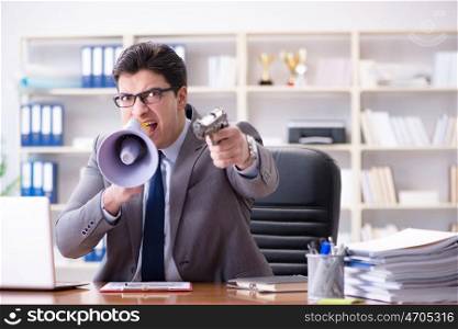 Angry aggressive businessman in the office