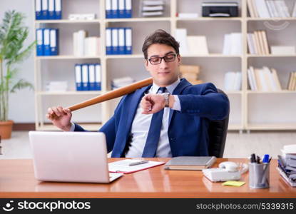 Angry aggressive businessman in the office