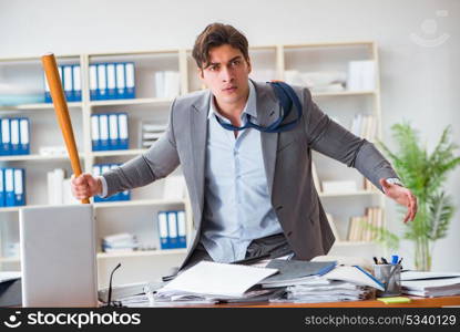 Angry aggressive businessman in the office