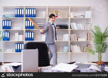 Angry aggressive businessman in the office