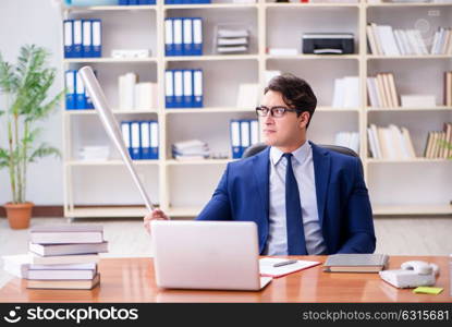 Angry aggressive businessman in the office