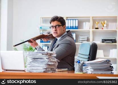 Angry aggressive businessman in the office