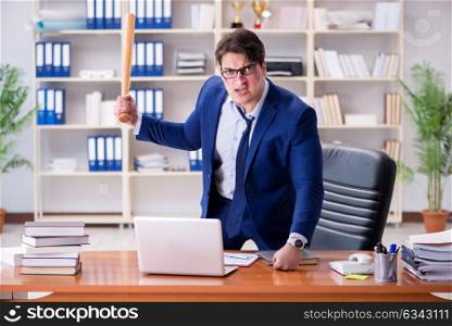 Angry aggressive businessman in the office