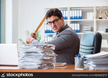 Angry aggressive businessman in the office