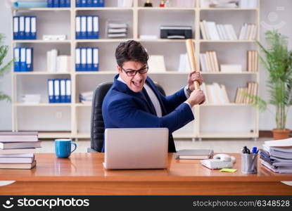 Angry aggressive businessman in the office