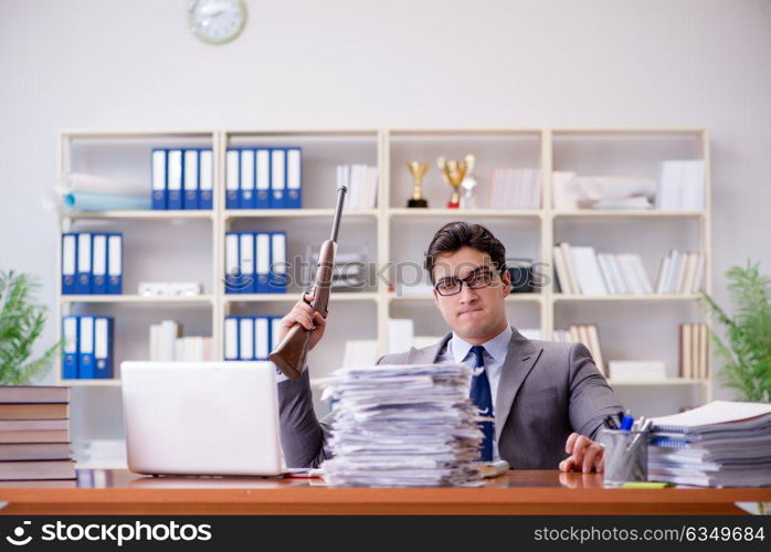 Angry aggressive businessman in the office