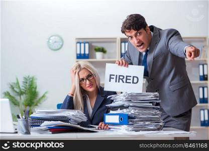 Angry boss firing his assistant secretary