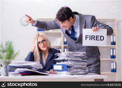 Angry boss firing his assistant secretary