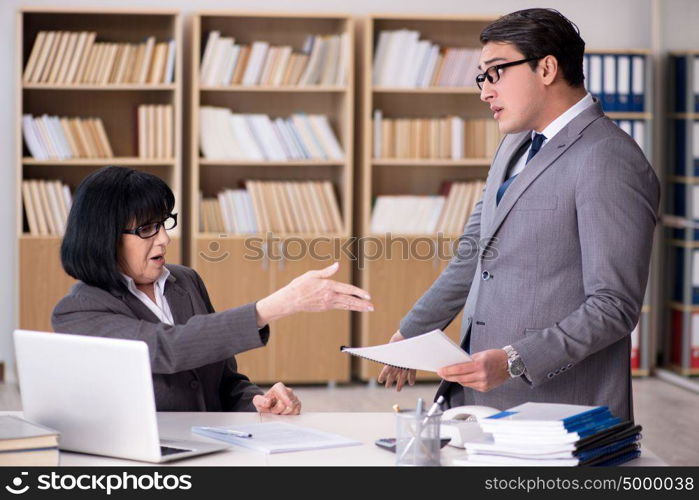 Angry boss reprimanding subordinate employee