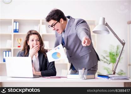Angry boss unhappy with female employee performance