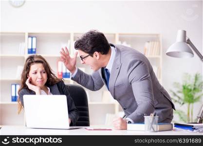 Angry boss unhappy with female employee performance
