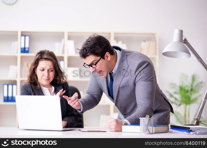 Angry boss unhappy with female employee performance