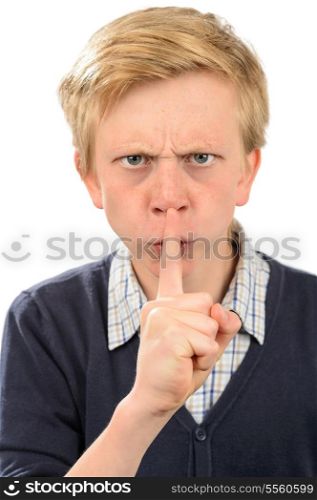 Angry boy with finger on lips isolated over white background