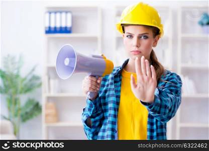 Angry building supervisor with megaphone. The angry building supervisor with megaphone