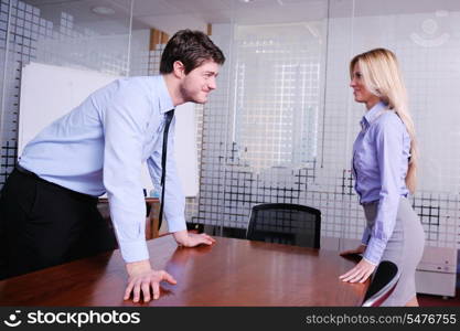 Angry business man screaming at employee in the office