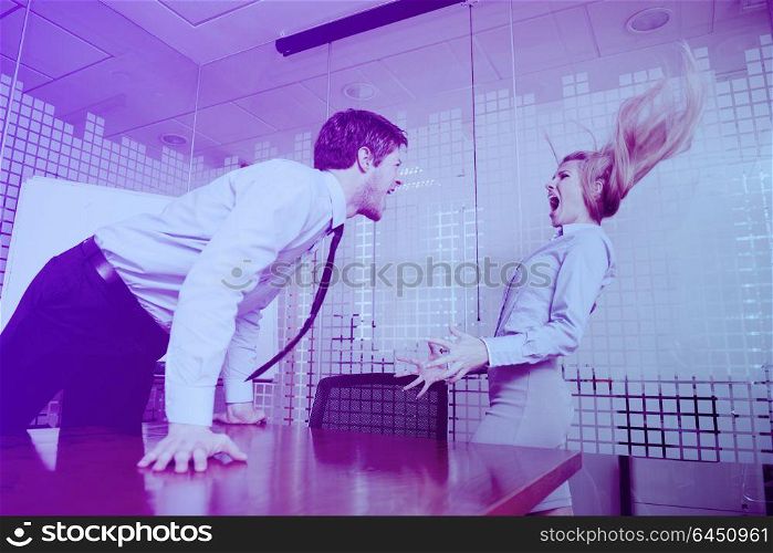 Angry business man screaming at employee in the office