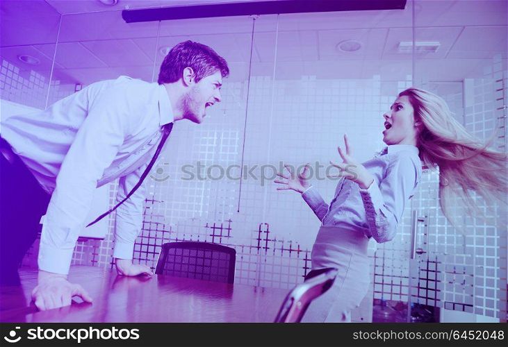 Angry business man screaming at employee in the office