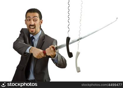 Angry businessman cutting the phone cable