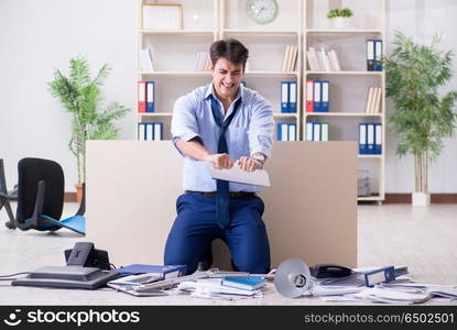 Angry businessman frustrated with too much work