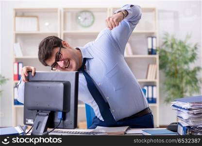 Angry businessman frustrated with too much work