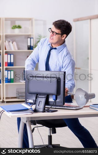 Angry businessman frustrated with too much work