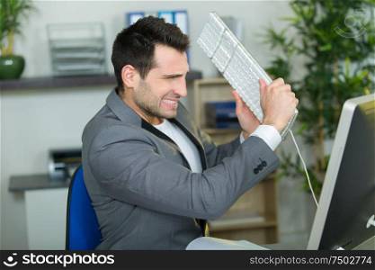 angry businessman in office