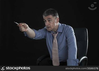 Angry Businessman Pointing a Pen