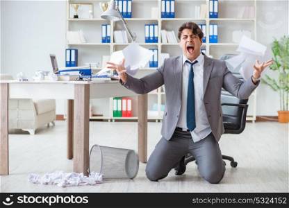 Angry businessman shocked working in the office fired sacked