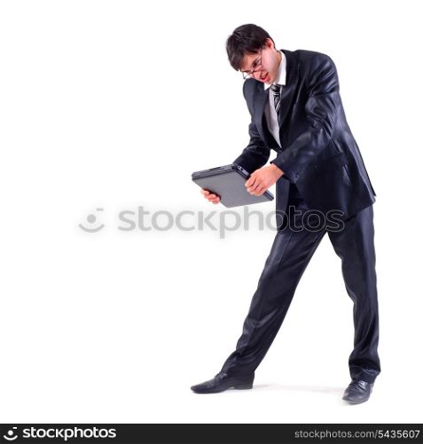 angry businessman want to crack the laptop, isolated on white