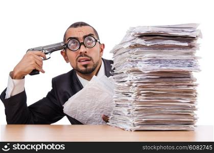 Angry businessman with stack of papers