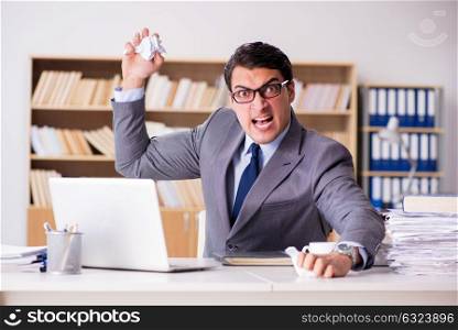Angry businessman working in the office