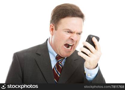 Angry businessman yelling into a cellphone. Isolated on white.