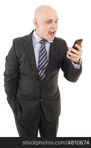 Angry businessman yelling into a cellphone. Isolated on white background