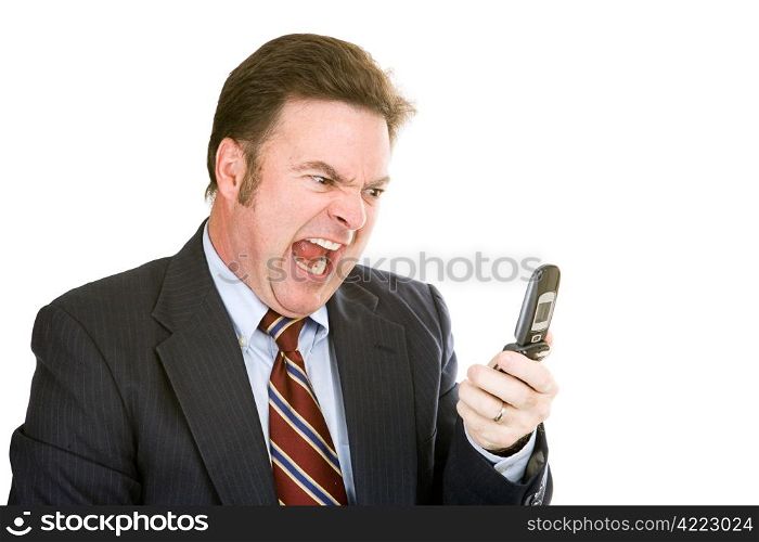 Angry businessman yelling into his cellphone. Isolated on white.