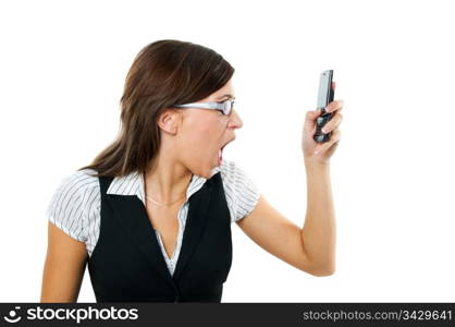 Angry businesswoman shouting to a mobile. Isolated on white