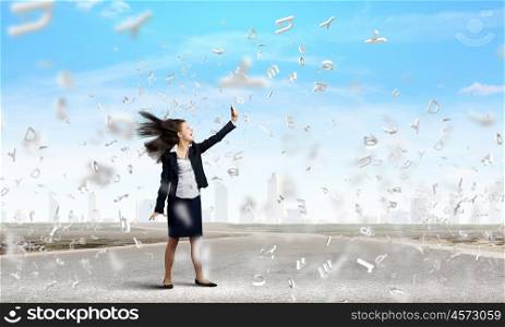 Angry businesswoman. Young businesswoman screaming with rage in mobile phone