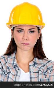 Angry construction worker making a face