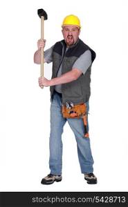 Angry construction worker with sledge-hammer