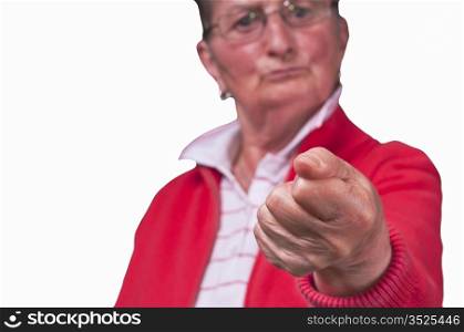 angry grandmother clenchs fist