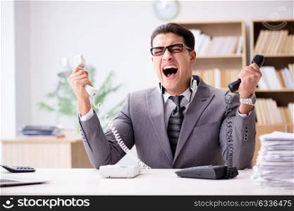 Angry helpdesk operator yelling in office